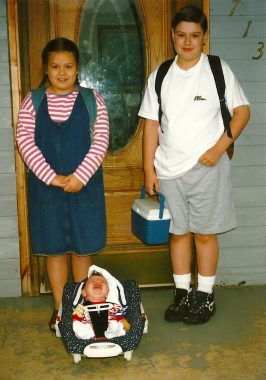 school  SMA News Today  The columnist's children Katie, Matthew, and baby Jeffrey post on their first day of school in 1997. Matthew is wearing a "No Fear" T-shirt.