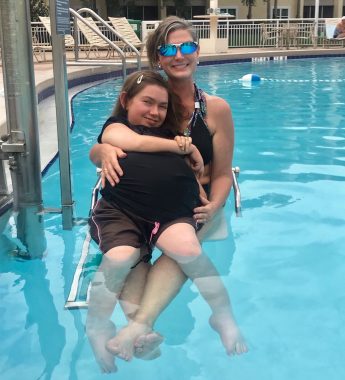 creative solutions | SMA News Today | Halsey and her mom smile while sitting together on a chairlift in the pool.