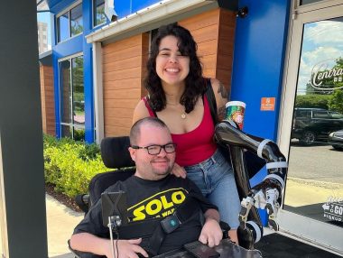 Cure SMA | SMA News Today | Kevin and his friend Luisa outside a barbecue joint in Memphis.